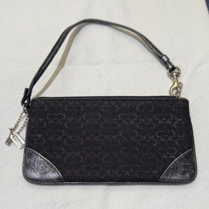 Coach Black Signature Wristlet with double mini metal hangtags.